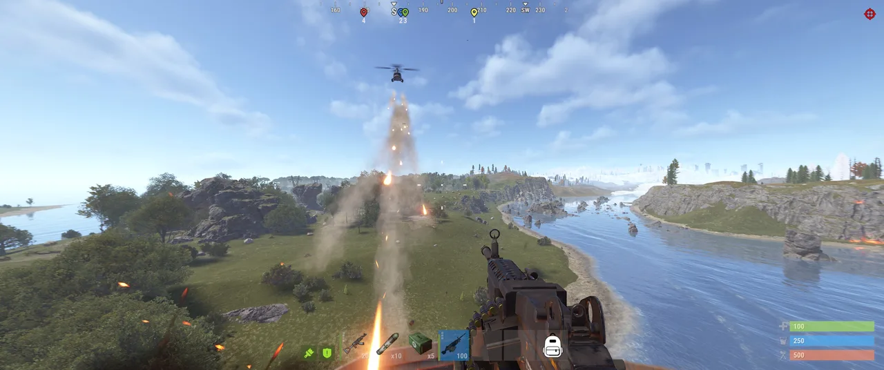 Rust gameplay: player fires at a helicopter over a river; HUD shows 100, 250, 500.